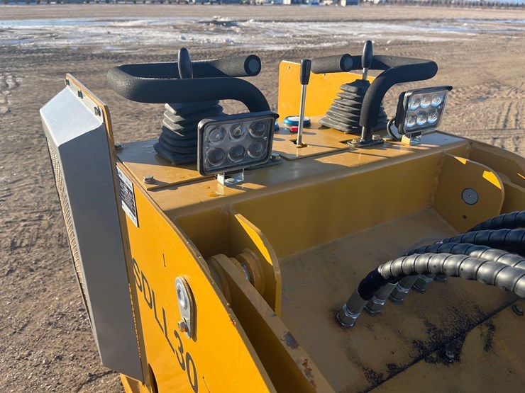 stand-on-skid-steer-image-8