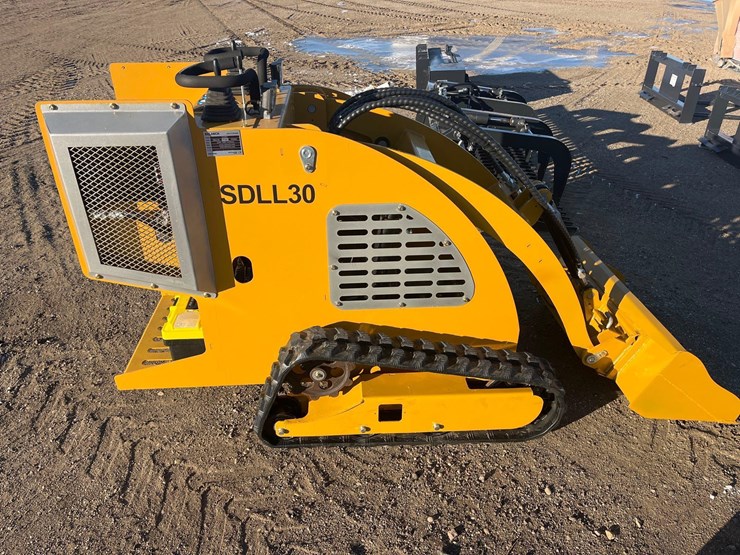 stand-on-skid-steer-image-10