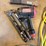 assortment-of-nail-guns-and-hose-image-4