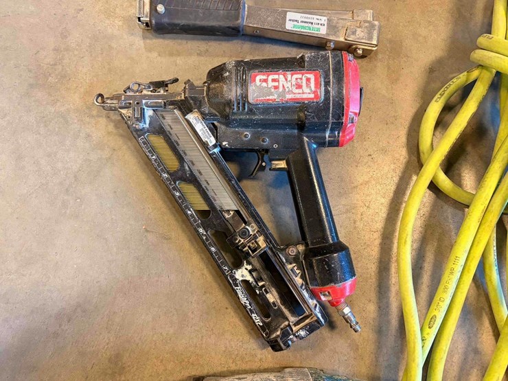 assortment-of-nail-guns-and-hose-image-4