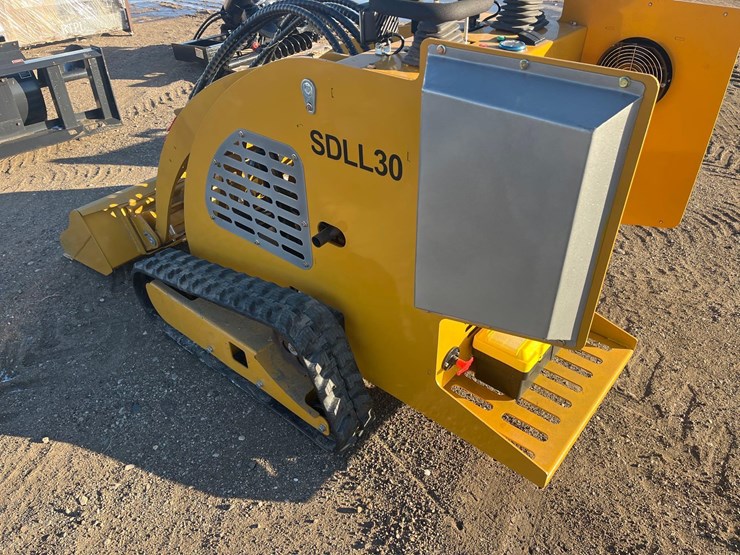 stand-on-skid-steer-image-14