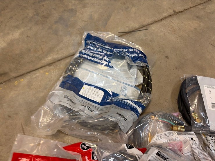 assortment-of-dryer-chords,-vent-tubes,-wash-machine-hoses,-and-range-power-cords-image-4