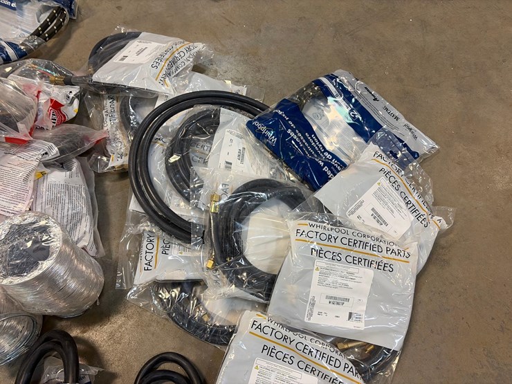 assortment-of-dryer-chords,-vent-tubes,-wash-machine-hoses,-and-range-power-cords-image-6