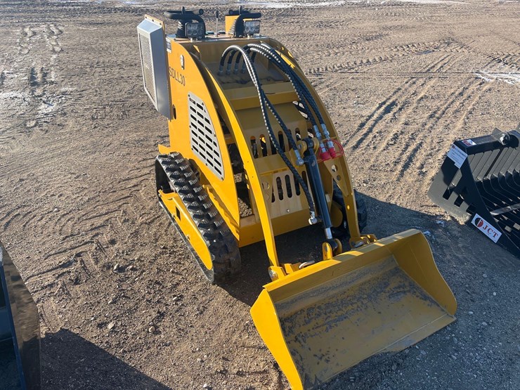 stand-on-skid-steer-image-2