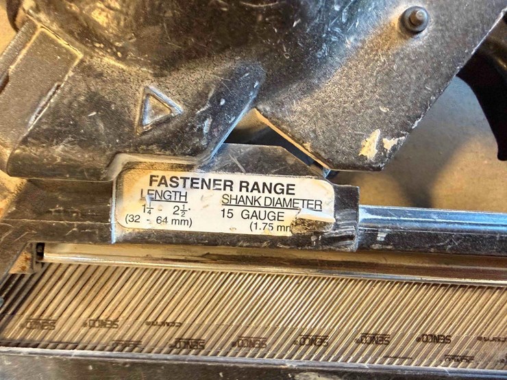 assortment-of-nail-guns-and-hose-image-6