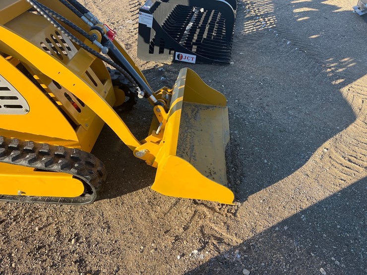 stand-on-skid-steer-image-5