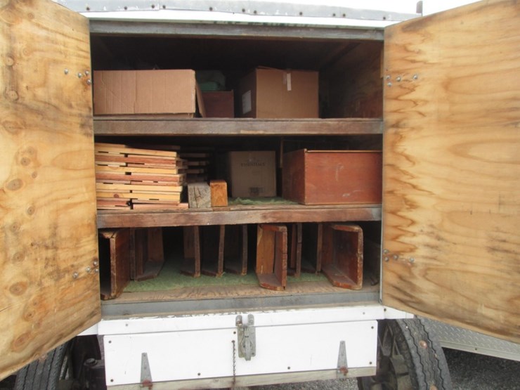 (inv.51037)-bench-wagon-with-approximately-200'-of-benches-and-ausband-song-books-image-2