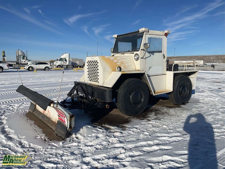 0-airport-tug-with-snow-plow-s/a-service-truck-image-1