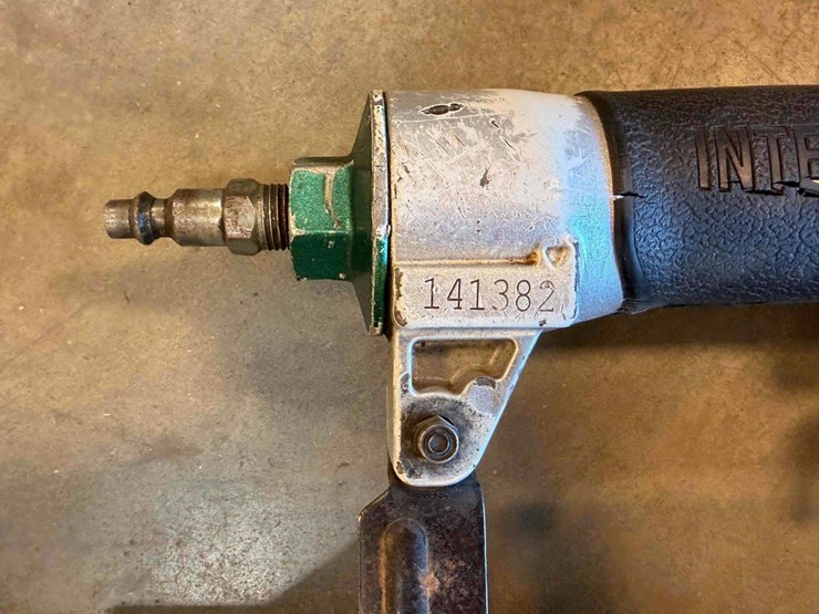 assortment-of-nail-guns-and-hose-image-8