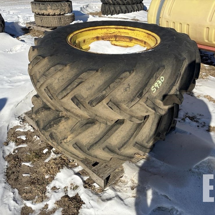 16.9-26 TIRES ON RIMS