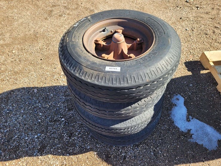 (4)-trailer-house-hubs,-wheels/tires-w/brake-hardware-image-1