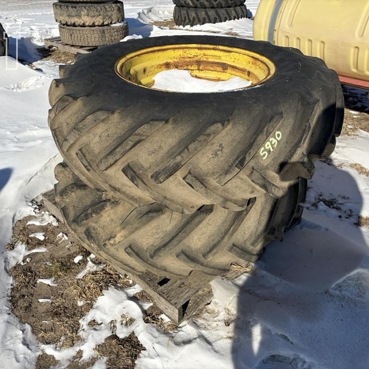 16.9-26 TIRES ON RIMS