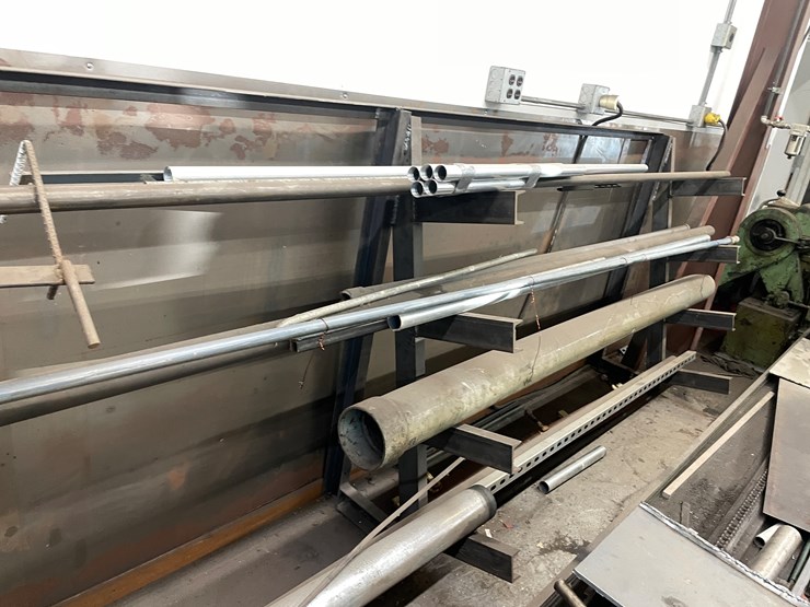 #5982-•-steel-rack-with-round-stock-image-5