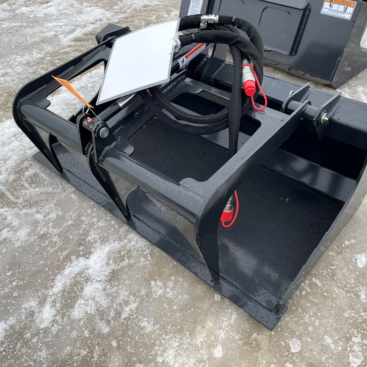 #2346 • Wolverine Mini Skid Steer Stump Grapple