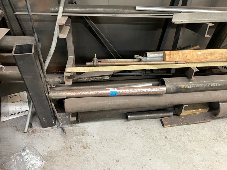 #5982-•-steel-rack-with-round-stock-image-3