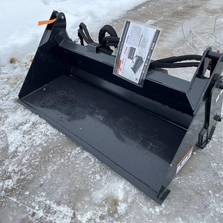 #2364 • Wolverine Mini Skid Steer Combination Bucket