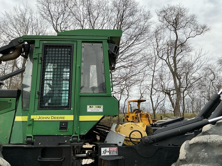 2010-deere-648h-image-58