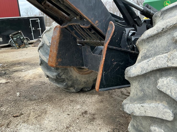 2010-deere-648h-image-44