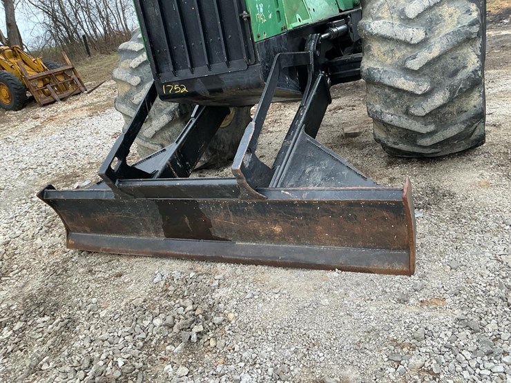 2010-deere-648h-image-63