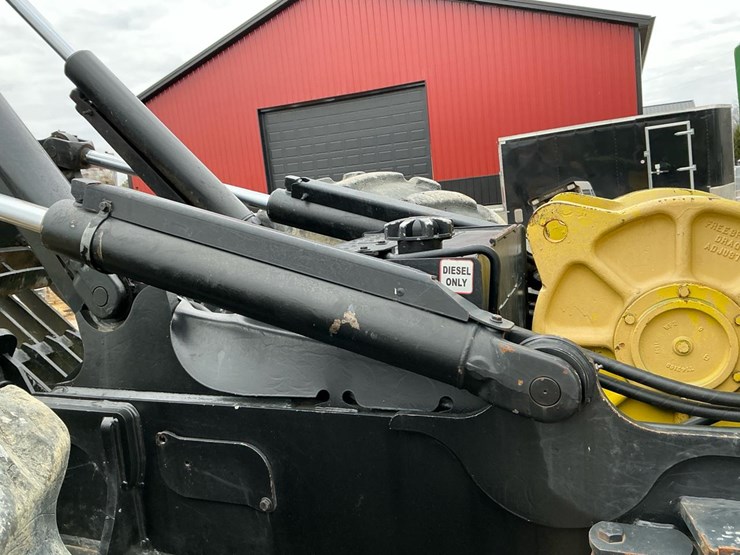 2010-deere-648h-image-42