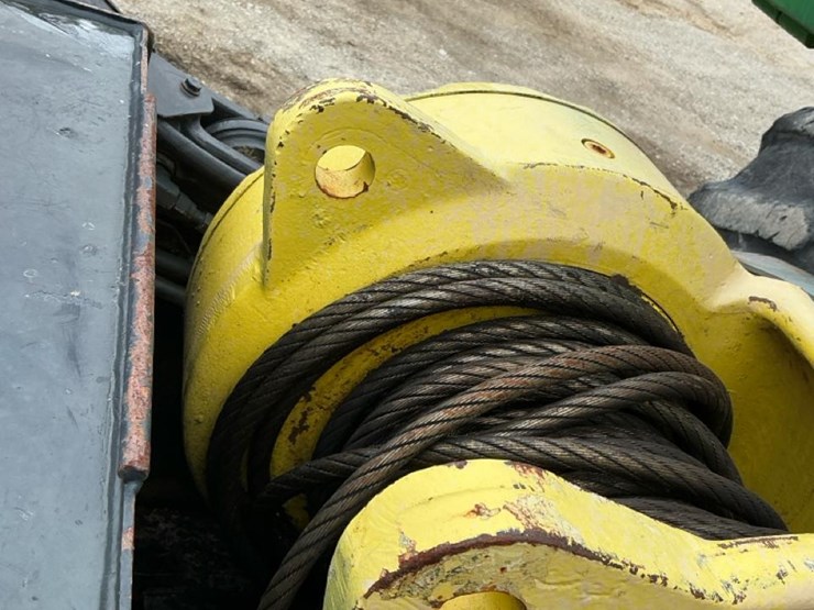 2010-deere-648h-image-40