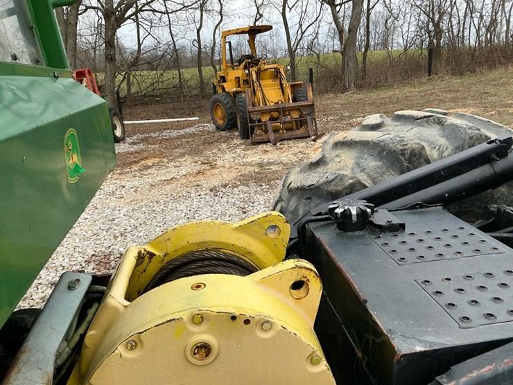 2010-deere-648h-image-53