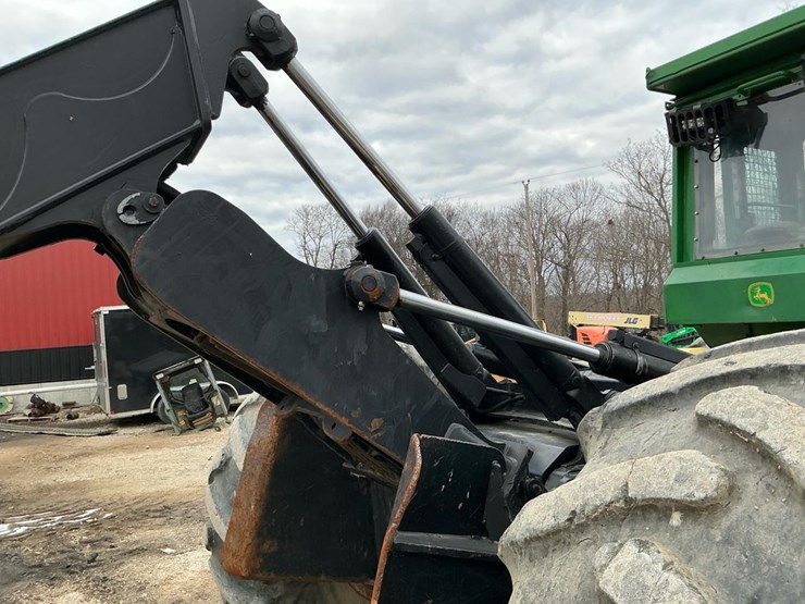 2010-deere-648h-image-45