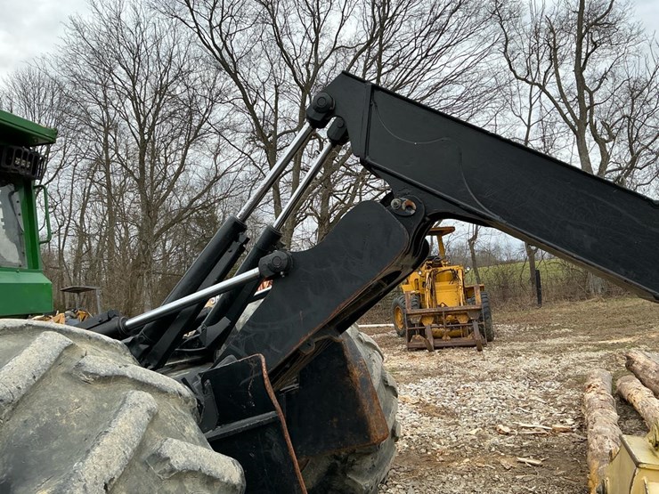 2010-deere-648h-image-52