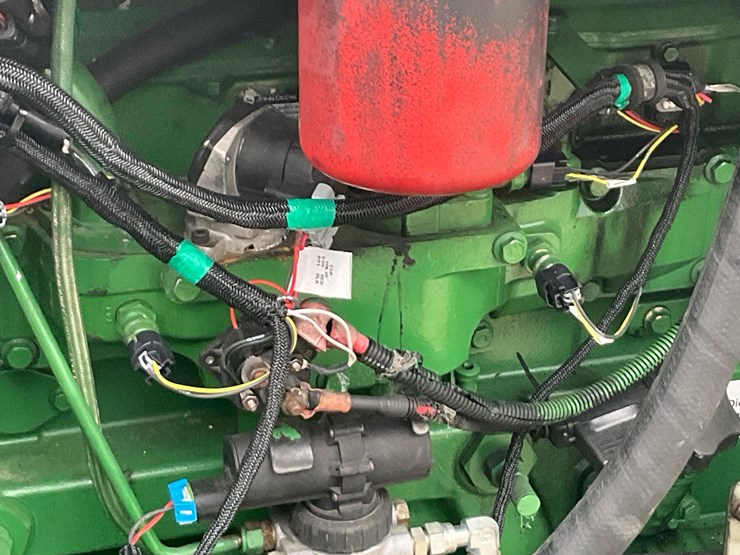 2010-deere-648h-image-22