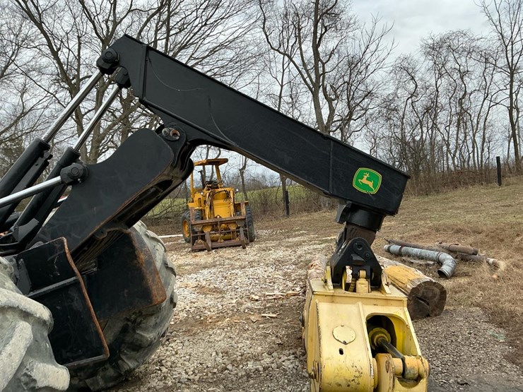 2010-deere-648h-image-51