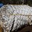 #5121-•-pallet-of-unused-boat-rope-with-loop-on-lens-image-1