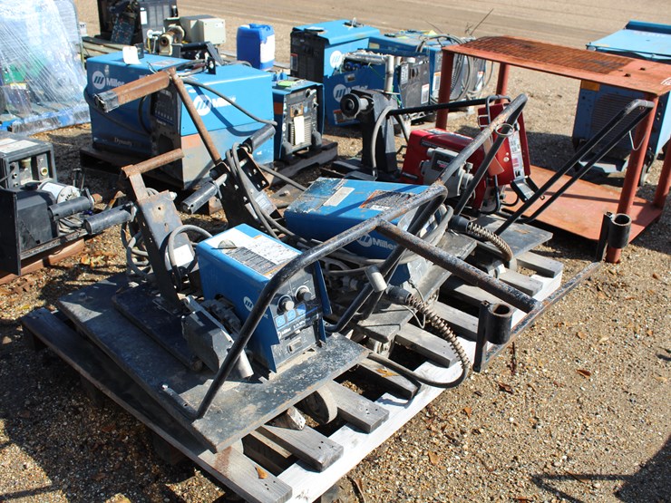 #5195-•-2-miller-s-74-mpo-plus-welder,-1-lincoln-10m-electric-welder-on-roll-around-cart-image-1