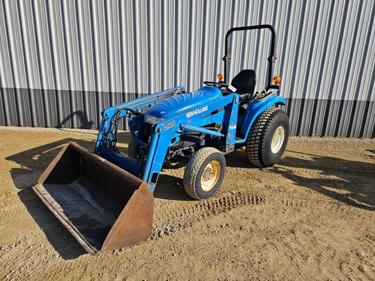 #165-•-new-holland-1630t-tractor-&-7308-loader-image-1