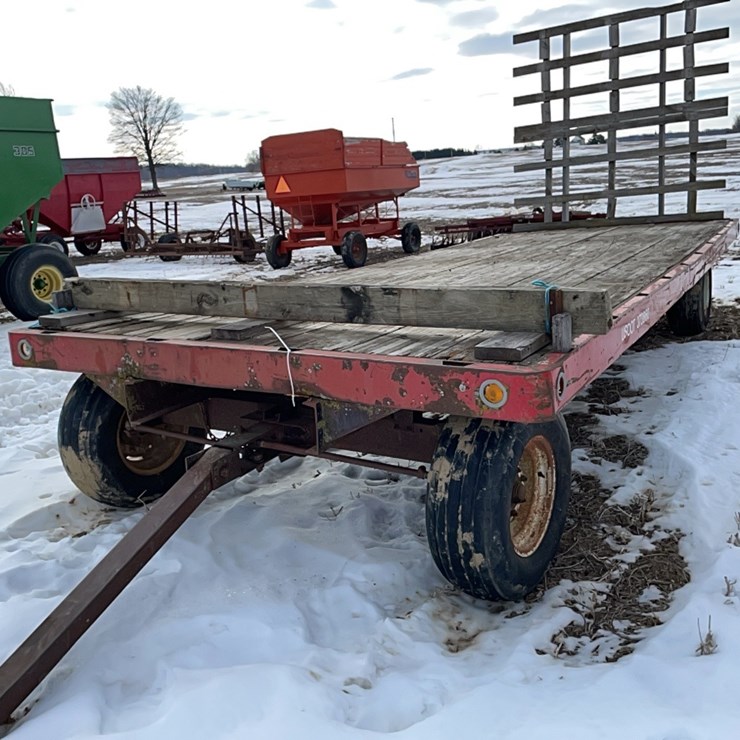 Tag #18, 20' flat rack wagon w/standard