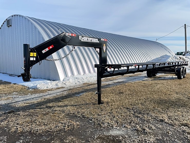 tag-#100,-new-36'-easy-haul-round-bale-trailer-image-1