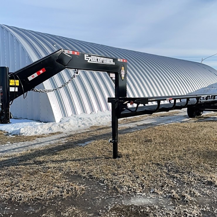 Tag #100, New 36' Easy Haul round bale trailer