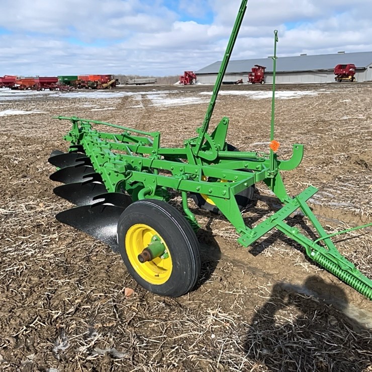 Tag #419, JD 4 btm plow, pull type