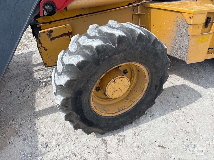 2014-deere-310sk-image-35