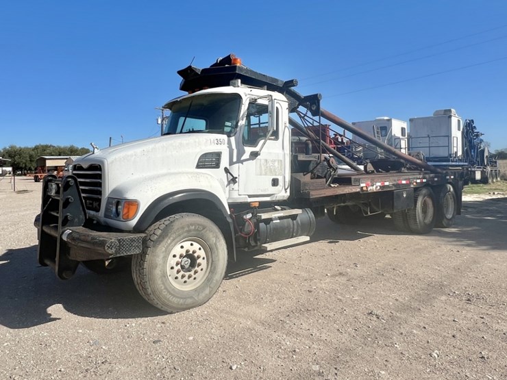 2007-mack-cv713-t/a-65k-gin-pole-winch-truck-image-1