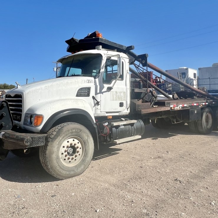 2007 MACK CV713 T/A 65K GIN POLE WINCH TRUCK
