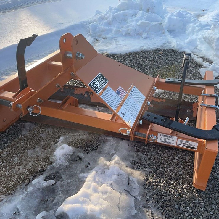 Woods grading scraper