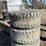 (4)-used/bald-12-16.5-skidsteer-tires-w/rims-image-2