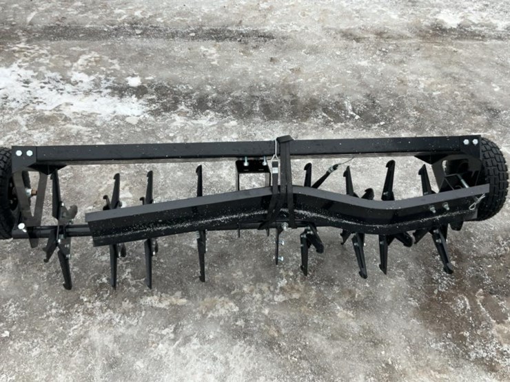 #963-•-unused-wolverine-a-sl48-grassland-aerator*-image-1