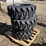 (4)-new-10-16.5-skidsteer-tires-image-1