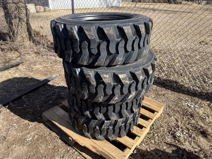 (4)-new-10-16.5-skidsteer-tires-image-1