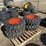 (4)-new-10-16.5-skidsteer-tires-w/rims-image-1