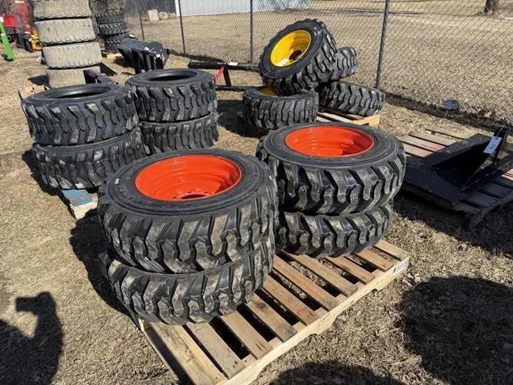 (4)-new-10-16.5-skidsteer-tires-w/rims-image-1