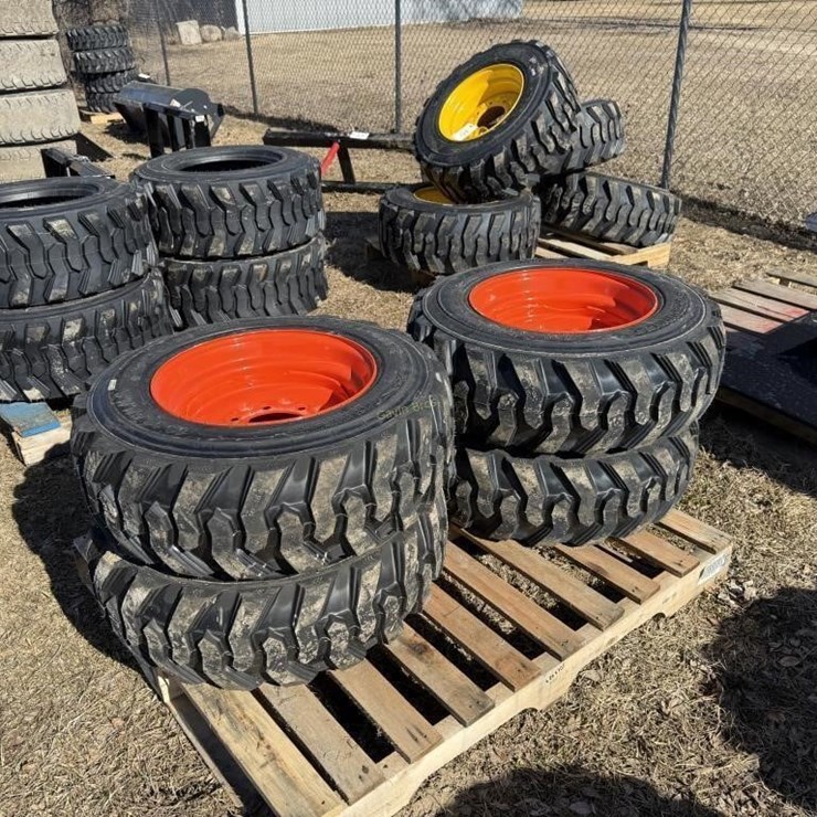 (4) New 10-16.5 Skidsteer Tires w/rims