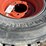 (4)-used/bald-12-16.5-skidsteer-tires-w/rims-image-4