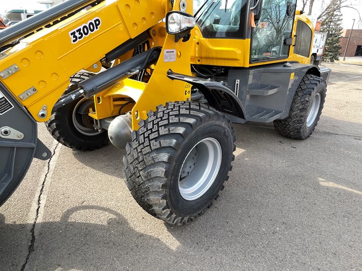 #114-•-new-magnum-3300p-telescoping-wheel-loader-image-13